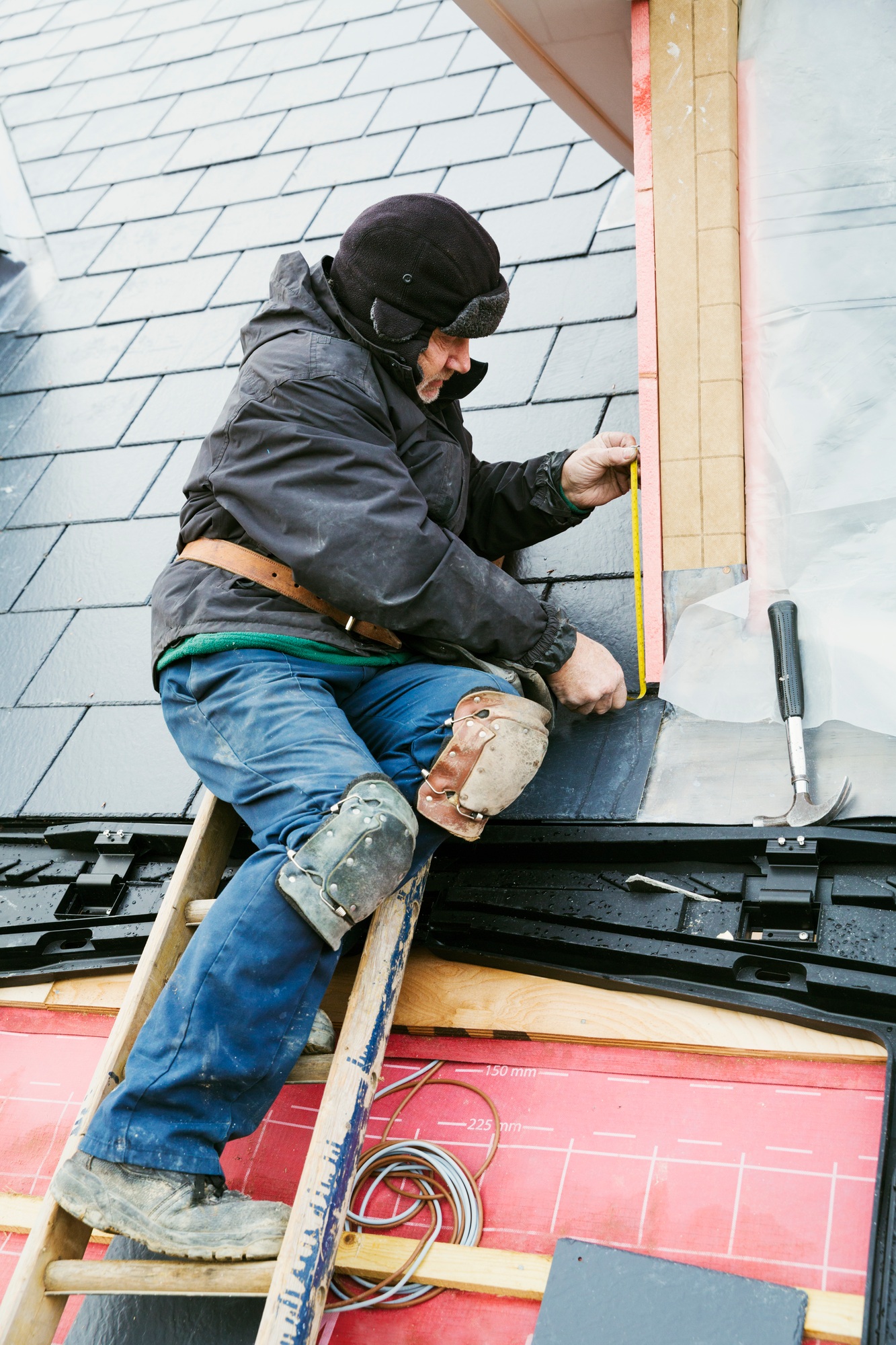 fixing tiles on a roof